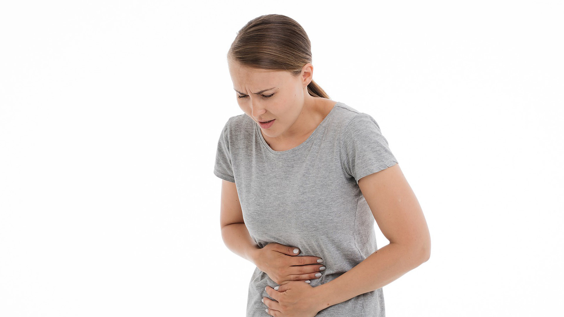 Болит спина у женщины