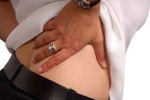 Болит спина справа внизу когда стоишь